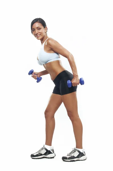 Young Woman doing fitness exercise with a hand weights. — Stock Photo, Image