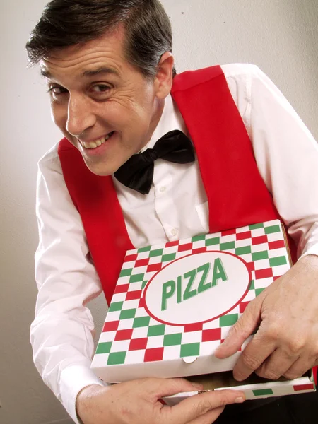 Entrega de pizza homem segurando caixa de pizza — Fotografia de Stock