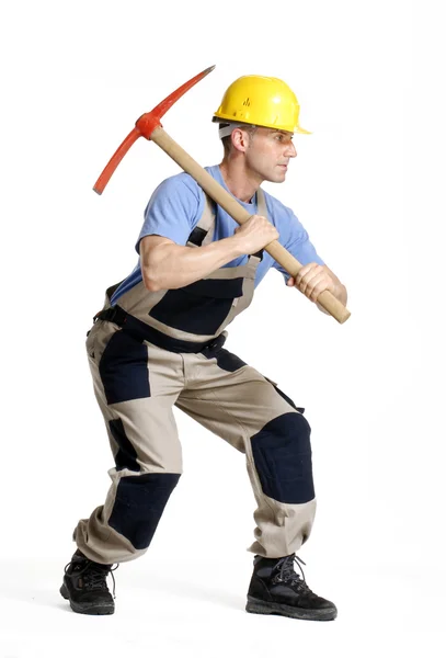 Retrato de trabalhador de construção segurando um pico. — Fotografia de Stock