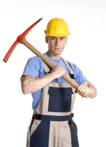 Retrato del trabajador de la construcción sosteniendo un pico. —  Fotos de Stock