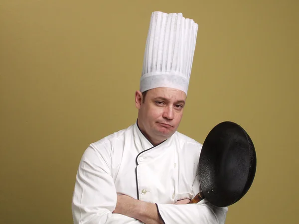 Jonge chef-kok bedrijf koekenpan — Stockfoto