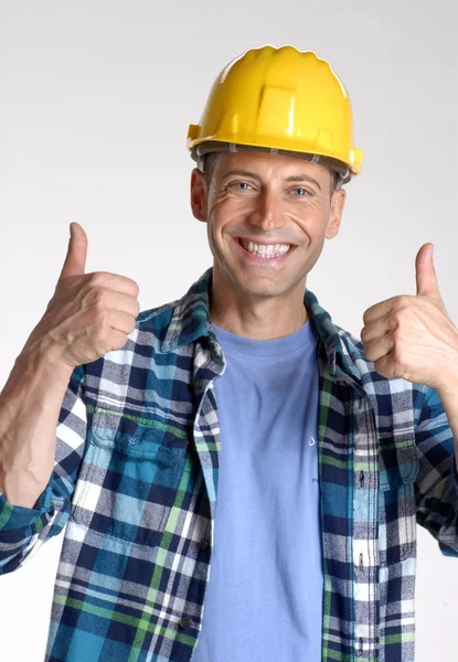 Young and happy construction worker portrait Stock Photo