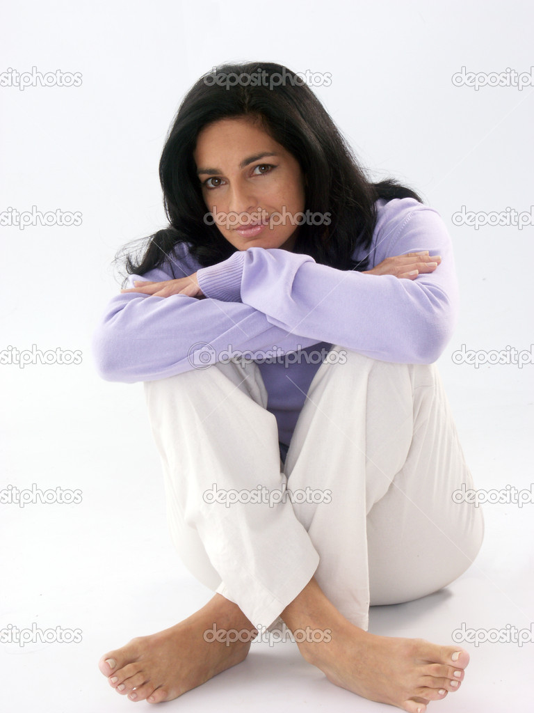 Beautiful young latin woman resting and smiling.