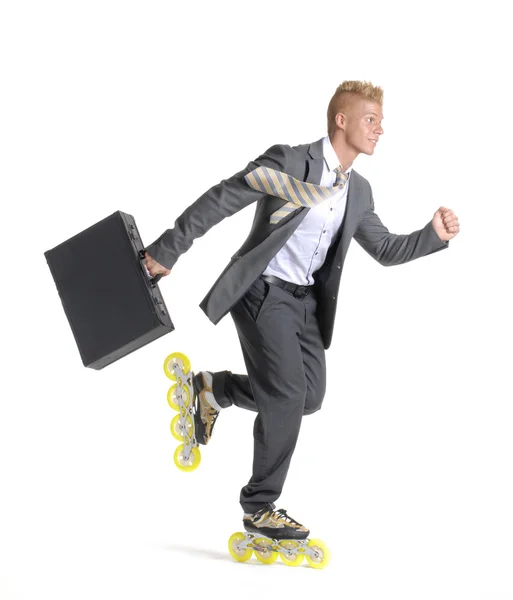 Young businessman skating on white background. — Stock Photo, Image