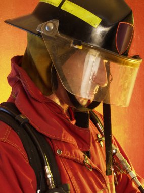 Firefighter in action. clipart
