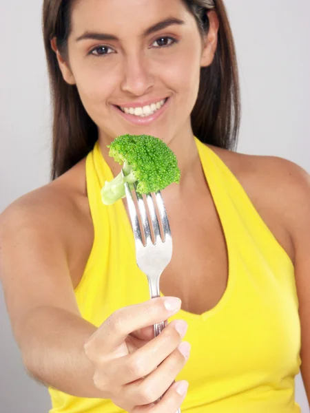 Young woman holding a cauliflower portion — Stock Photo, Image