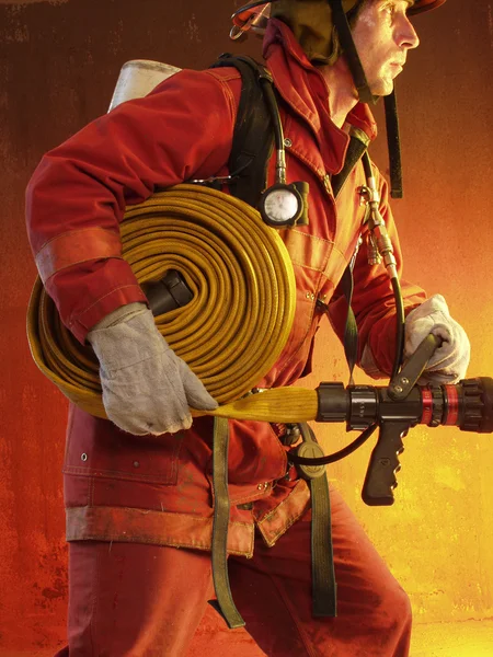 Firefighter in action. — Stock Photo, Image