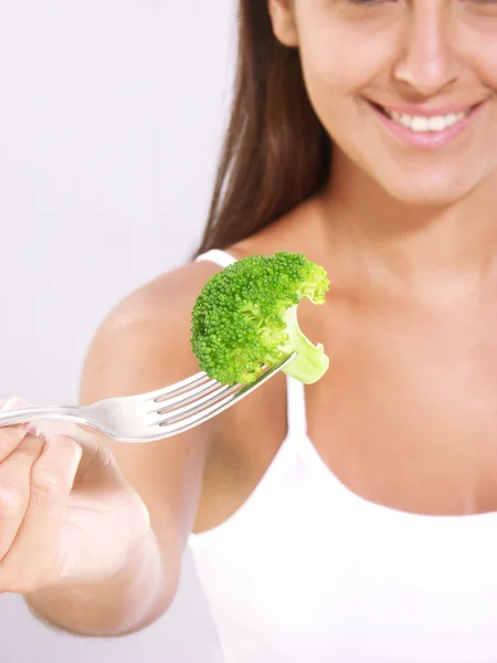 Young woman holding a cauliflower portion — Stock Photo, Image