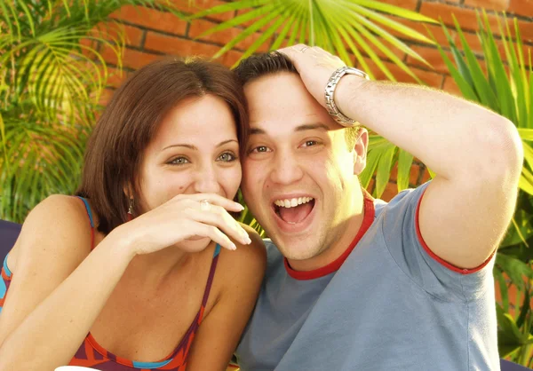 Young couple enjoying in a cafe — Stock Photo, Image