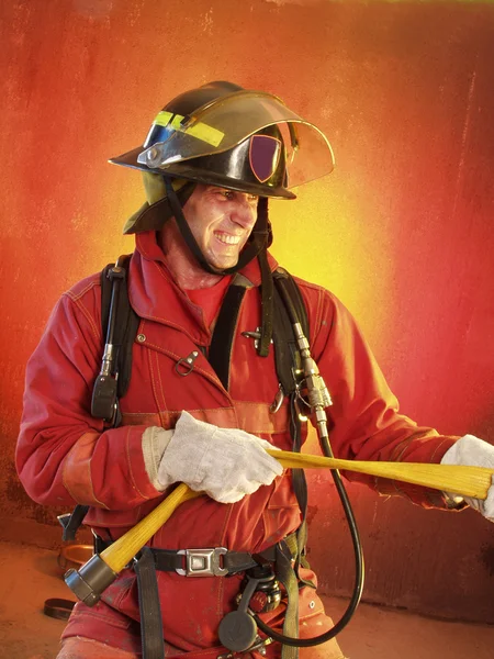 Pompier en action . — Photo