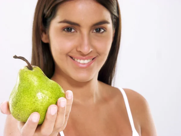 Young woman holding fresh pears. — Stock Photo, Image