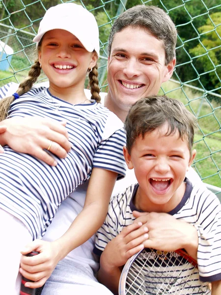 Family tennis portrait. — Stock Photo, Image