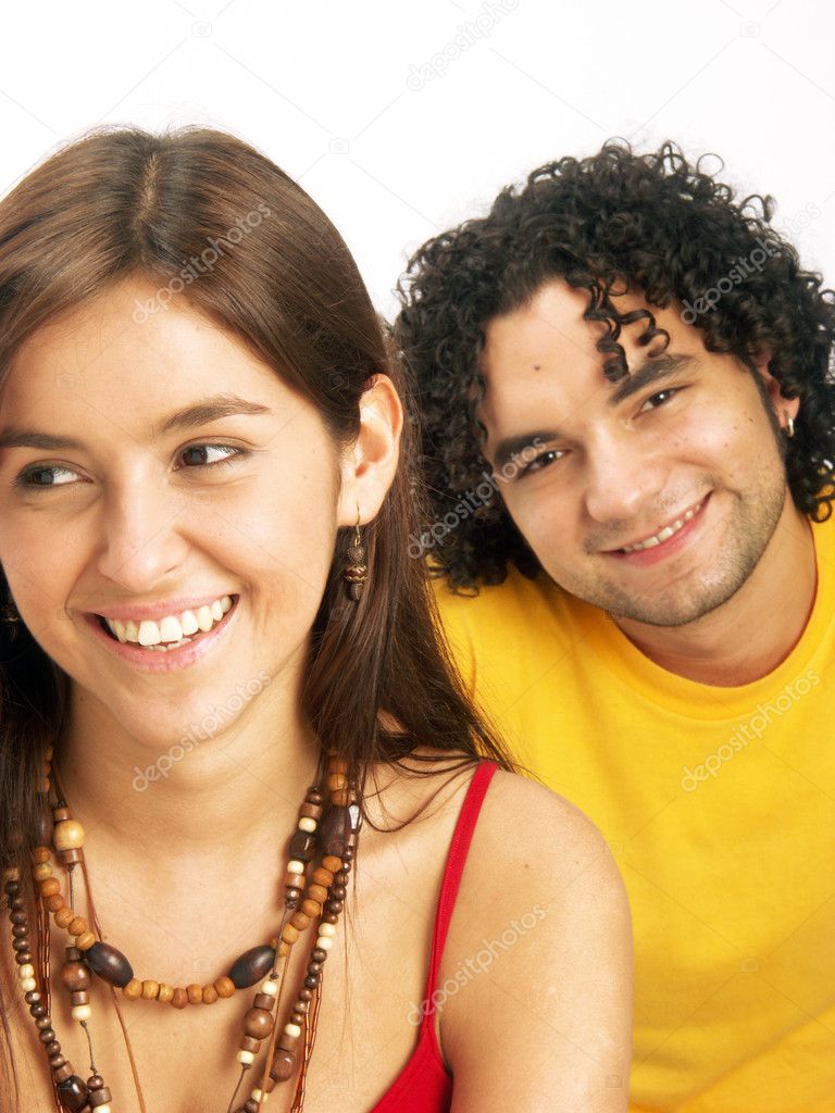 Young hispanic couple joying together.