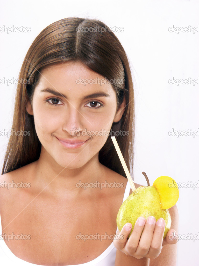 Young woman drinking pear juice.