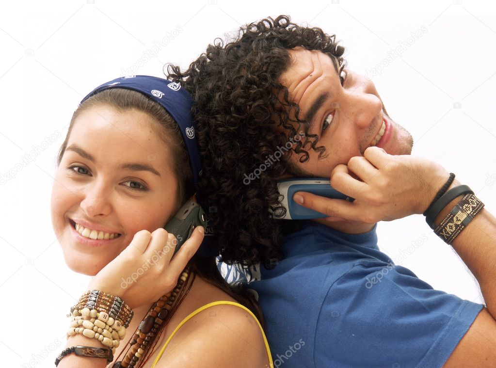 Young couple using a mobile phone.