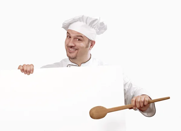 Cook holding white card Cook holding white panel and spoon. — Stock Photo, Image