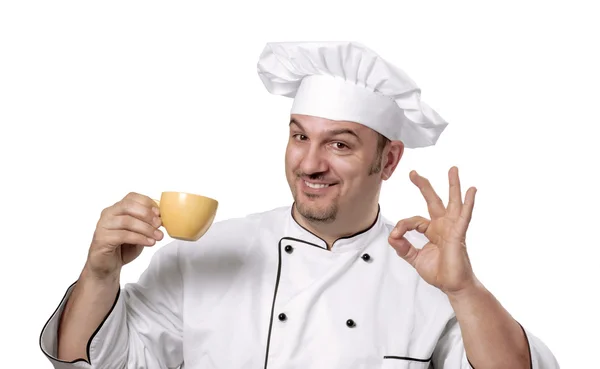 Cook portrait drinking coffee on white background. — Stock Photo, Image