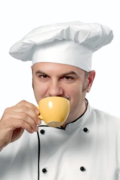 Cook drinking coffee on white background. — Stock Photo, Image