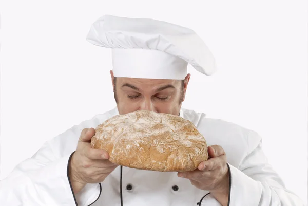 Cuisiner en tenant du pain. Chef tenant du pain . — Photo