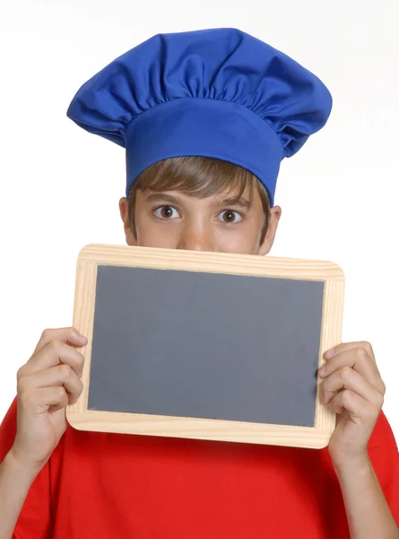 Chef niño sosteniendo una pizarra escolar, Niño sosteniendo pizarra . —  Fotos de Stock