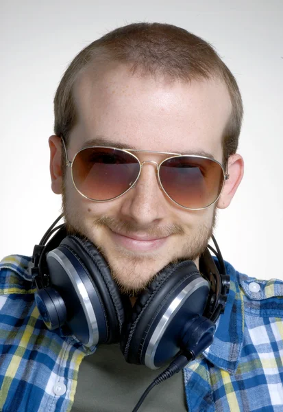 Young man using headphones, Dj listening music . — стоковое фото