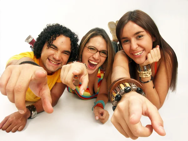 Three friends sharing and smiling on white background. — Stock Photo, Image