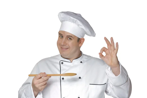 Koch hält einen Kochlöffel in der Hand. — Stockfoto