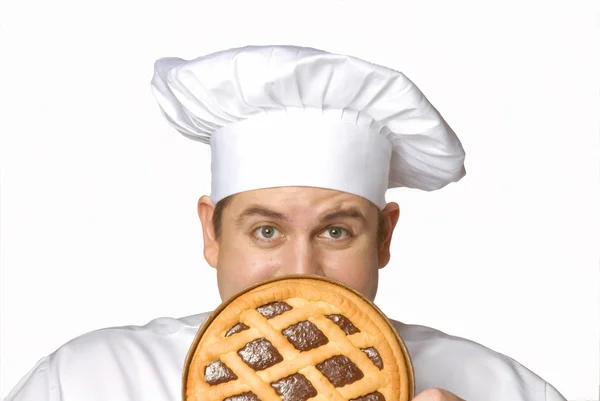 Chef holding a big chocolate pie cake — Stock Photo, Image