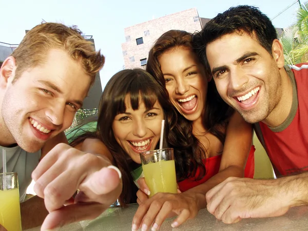 Hispanic friends enjoying together. — Stock Photo, Image