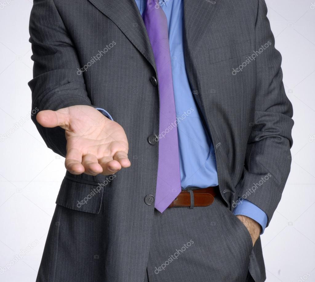 Young businessman with raised hand