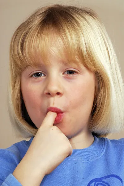 Little girl sucking her finger. — Stock Photo, Image