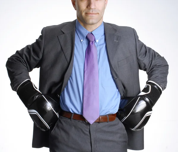 Businessman with boxing gloves isolated on white background — Stock Photo, Image