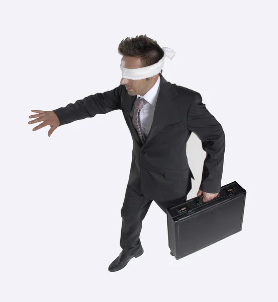 Blindfold businessman on white background — Stock Photo, Image