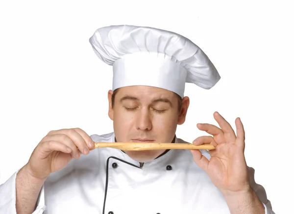 Cook tasting bread sticks,happy chef portrait. — Stock Photo, Image