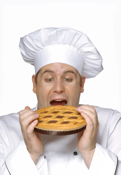 Chef segurando um bolo de torta de chocolate grande, cozinhe segurando uma torta de chocolate — Fotografia de Stock