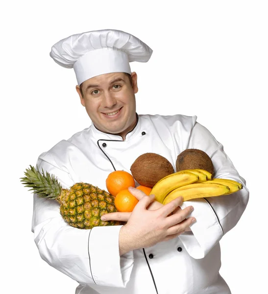 Happy chef holding fruits — Stock Photo, Image