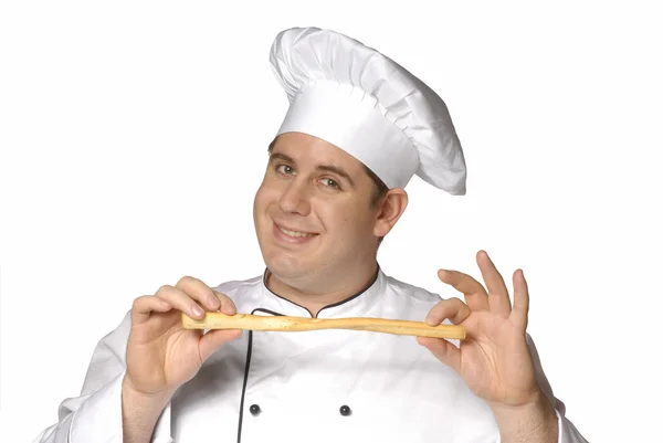 Cook tasting bread sticks,happy chef portrait. — Stock Photo, Image