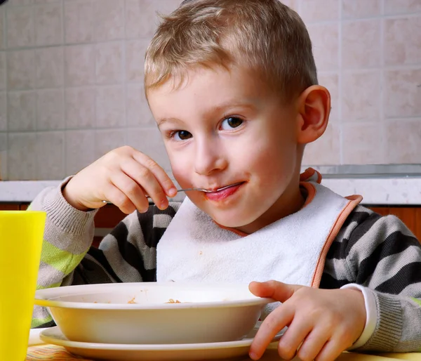 Little kid portrait eating — Stock Photo, Image