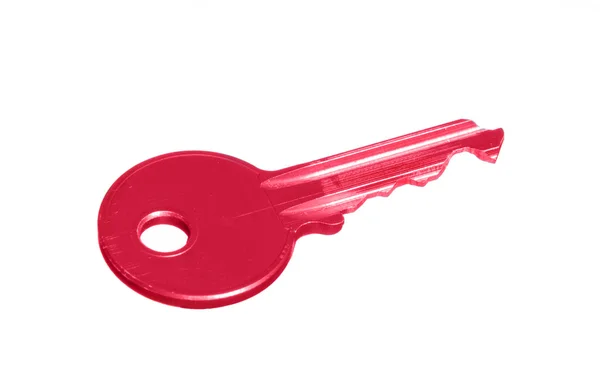 Pink key isolated on white — Stock Photo, Image