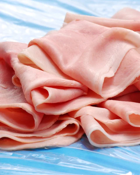 Prosciutto ham slices detail.Slices of ham. — Stock Photo, Image