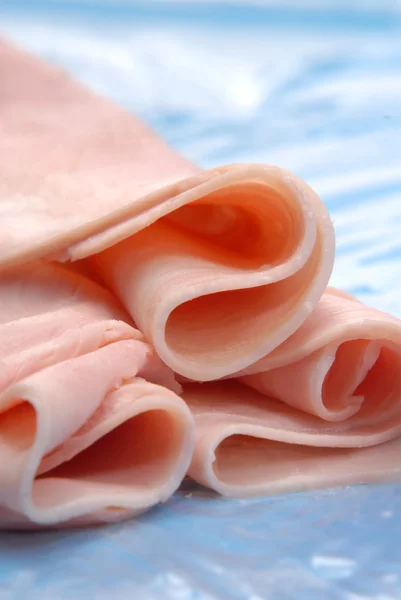 Prosciutto ham slices detail.Slices of ham. — Stock Photo, Image