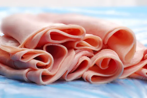 Prosciutto ham slices detail.Slices of ham. — Stock Photo, Image