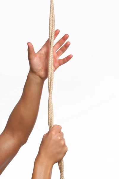 Man hands climbing up rope — Stock Photo, Image