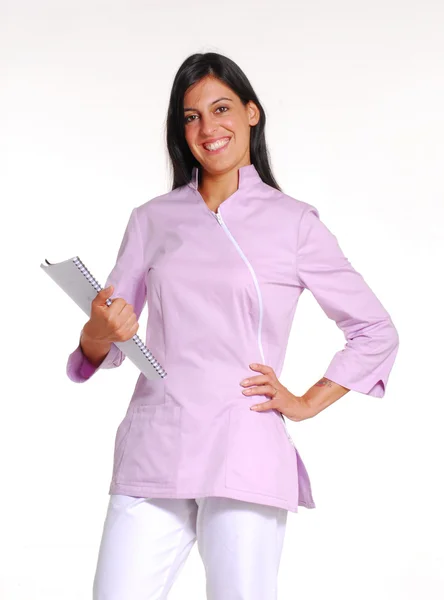 Jovem profissional de saúde mulher médico segurando um notebook em fundo branco . — Fotografia de Stock