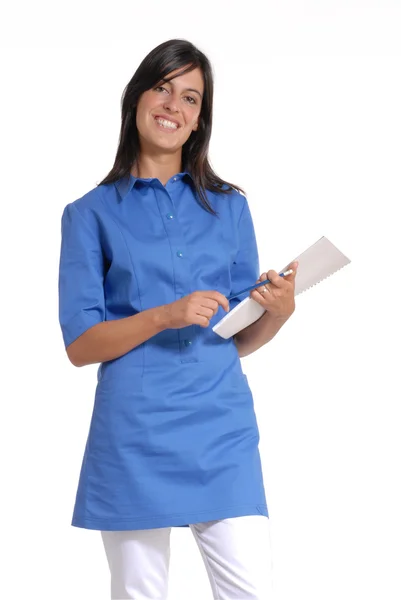 Jovem profissional de saúde mulher médico segurando um notebook em fundo branco . — Fotografia de Stock