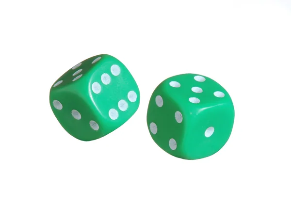 Beyaz background.throwing dices üzerinde yeşil dices. — Stok fotoğraf