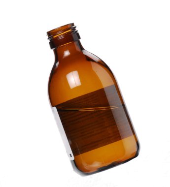 bir şurup şişe ve çay kaşığı.