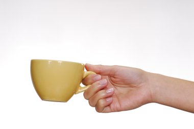 bir bardak tutan bir youg el.