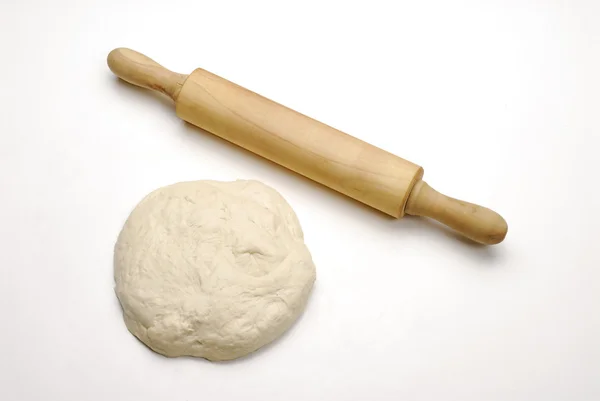 Floured Rolling Pin on Pizza Dough. — Stock Photo, Image