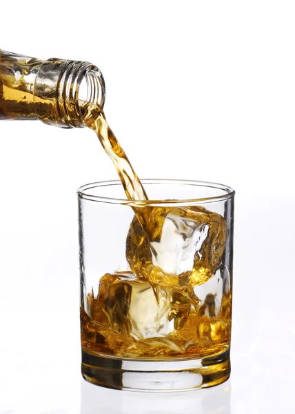 Pouring whisky drink and ice cube — Stock Photo, Image